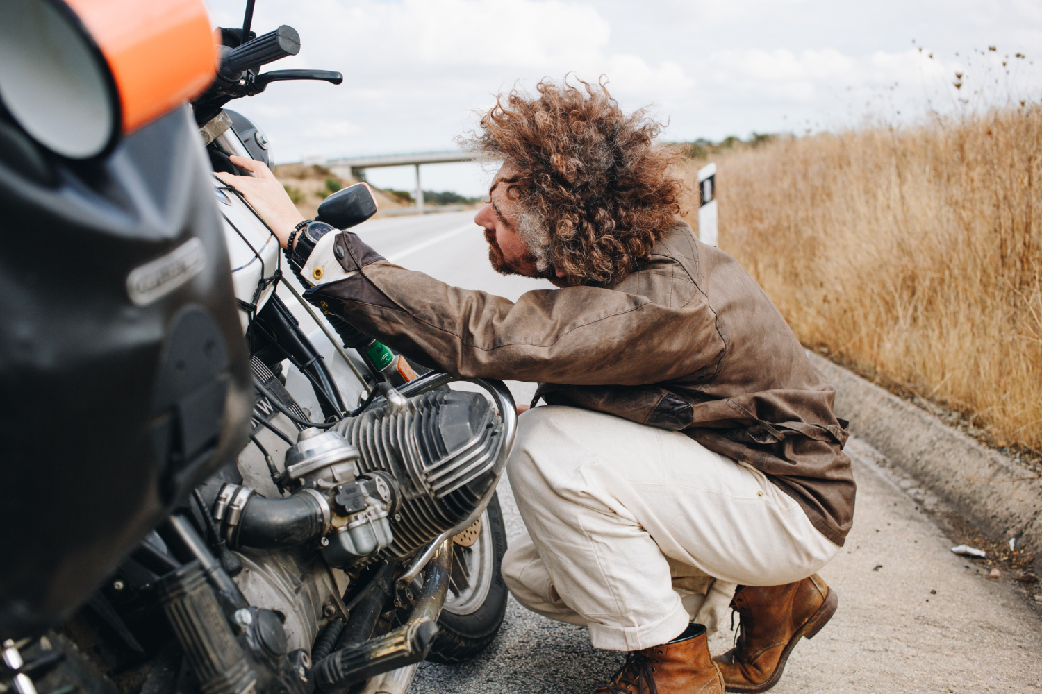 Motorcycle Breaks Down img
